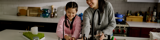 Mom and Daughter Enjoying Kinetico Reverse Osmosis Water